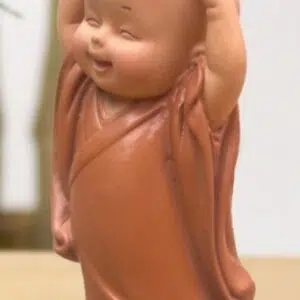 Bébé Bonze orange petit farceur Tenzin - 8,5cm